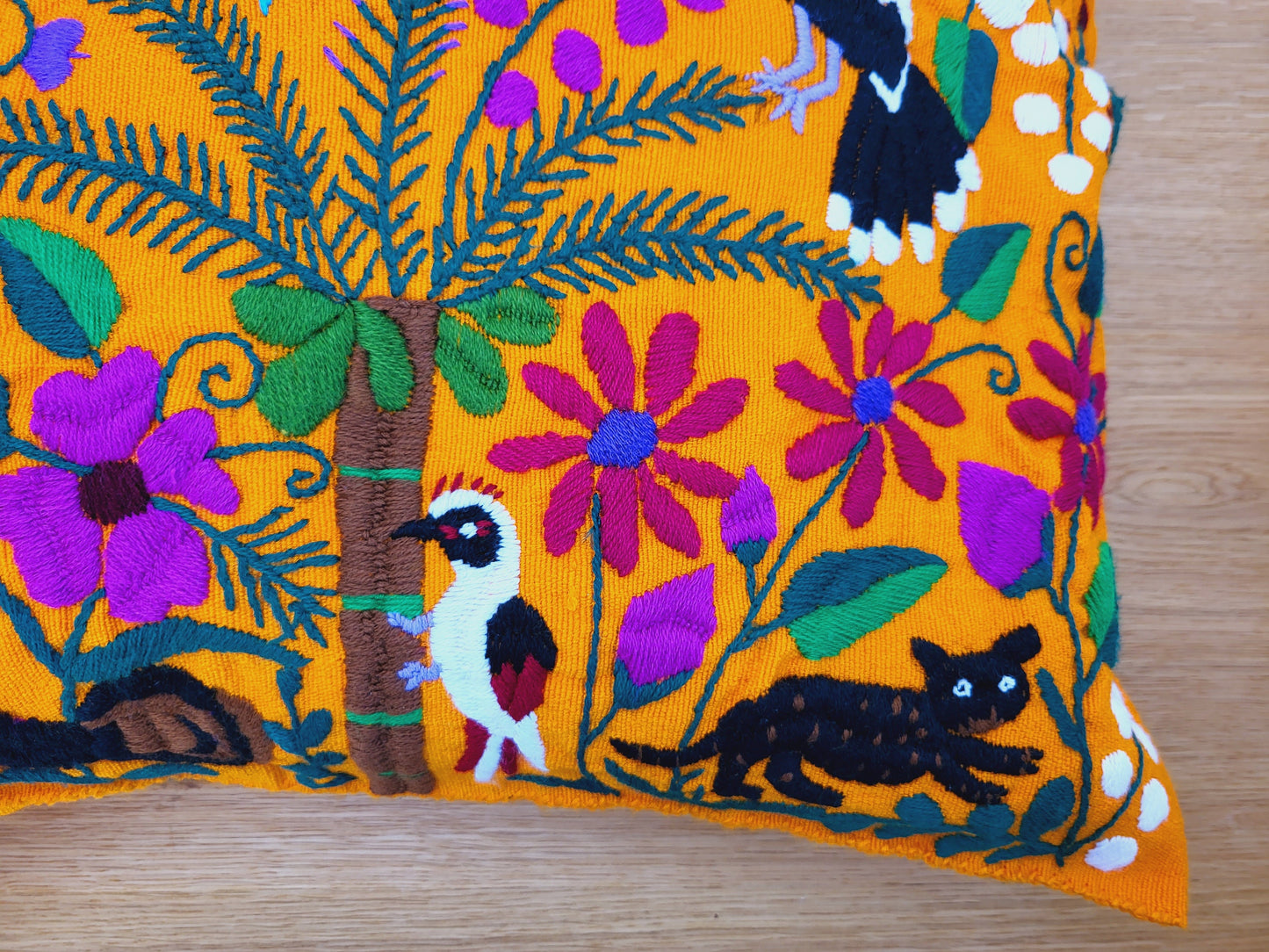 Animal print cushion, hand embroidered and woven in Mexico by indigenous women