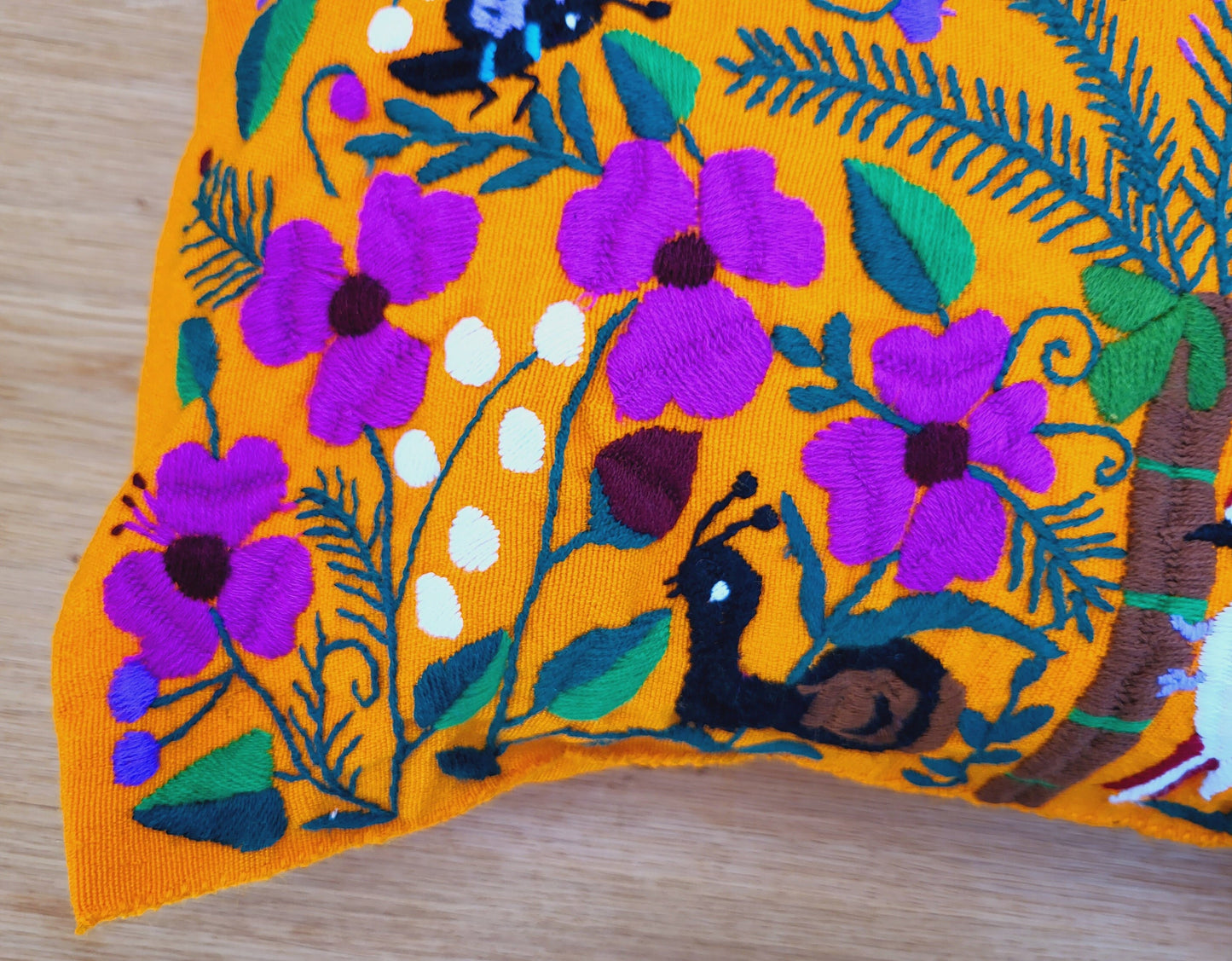 Animal print cushion, hand embroidered and woven in Mexico by indigenous women