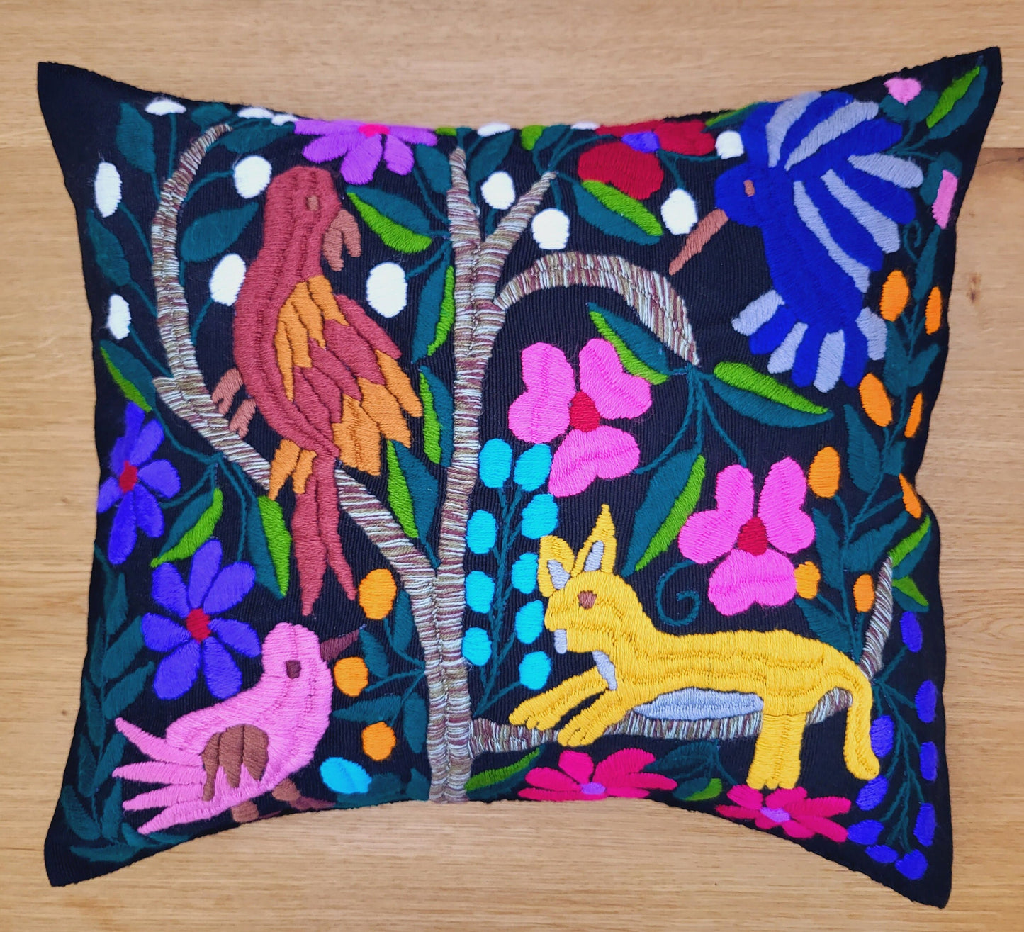 Animal print cushion, hand embroidered and woven in Mexico by indigenous women