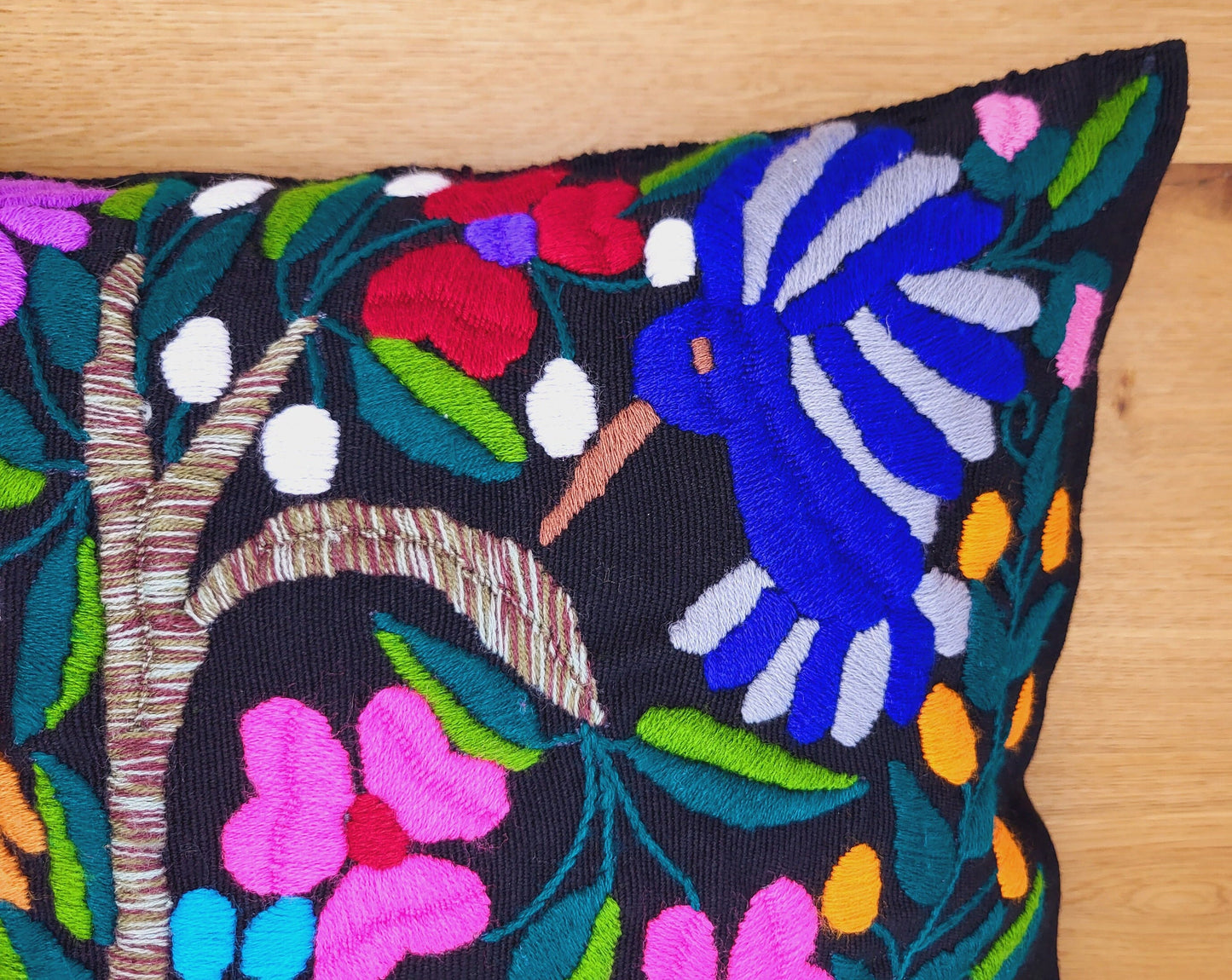 Animal print cushion, hand embroidered and woven in Mexico by indigenous women