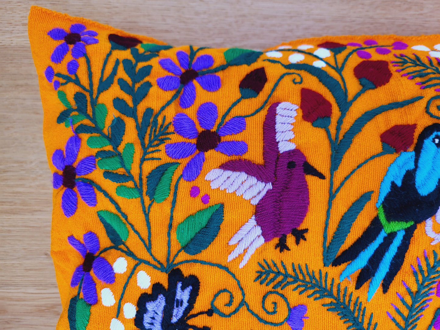 Animal print cushion, hand embroidered and woven in Mexico by indigenous women