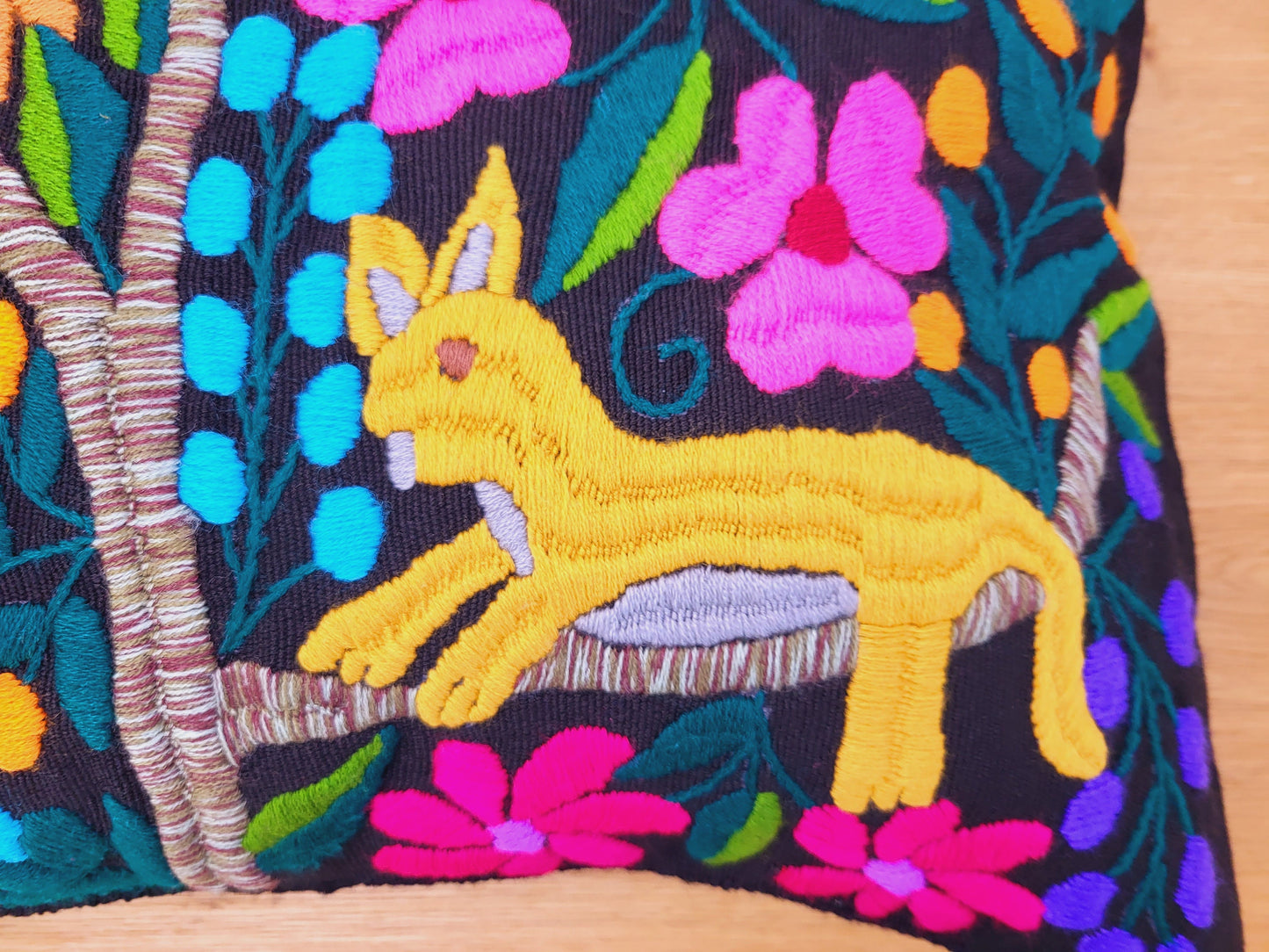 Animal print cushion, hand embroidered and woven in Mexico by indigenous women