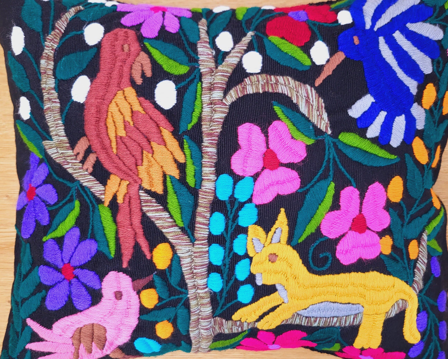 Animal print cushion, hand embroidered and woven in Mexico by indigenous women
