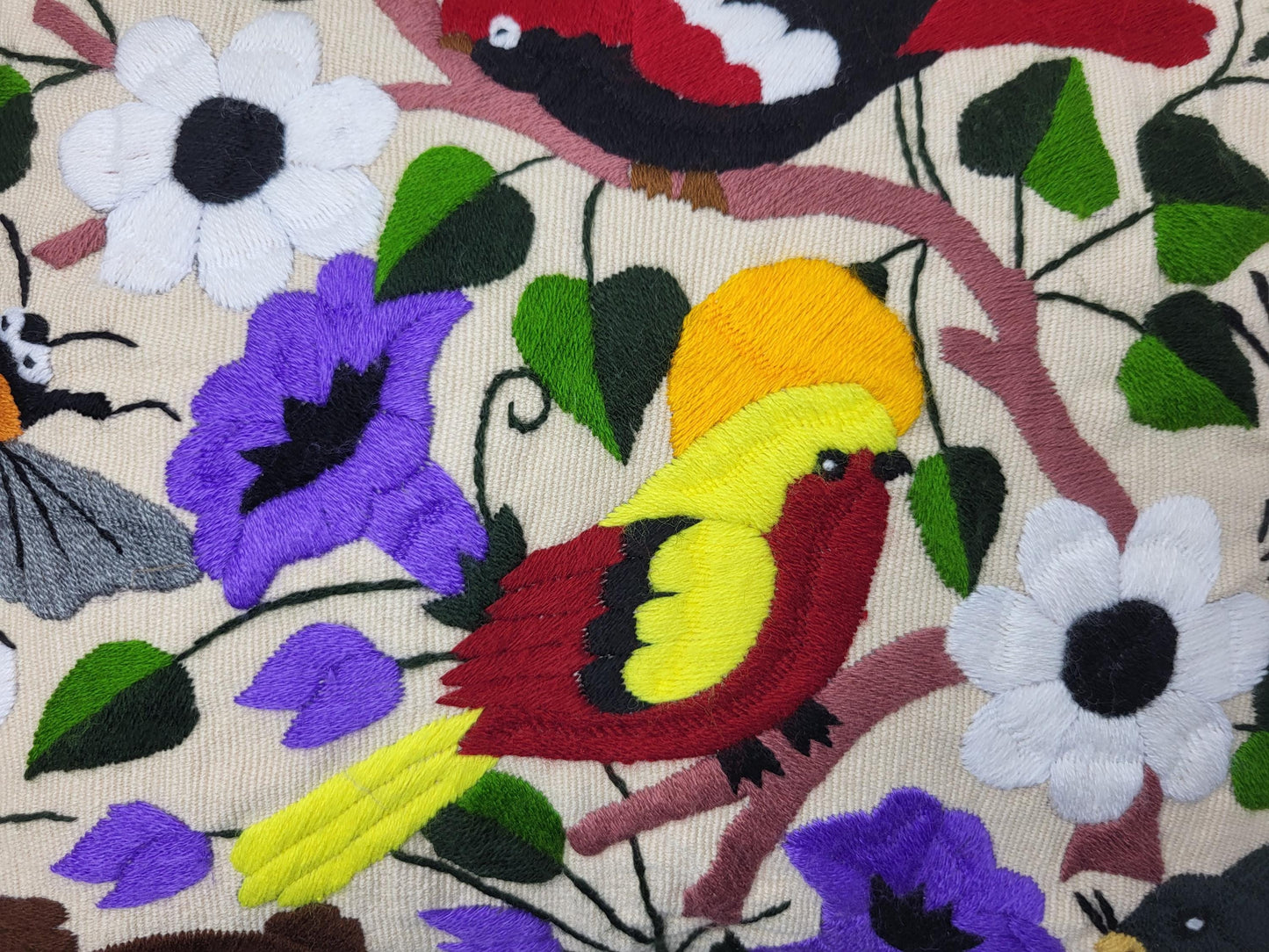 Hand-embroidered and woven Mexican cushion cover with animal pattern β Unique handicrafts from Mexico