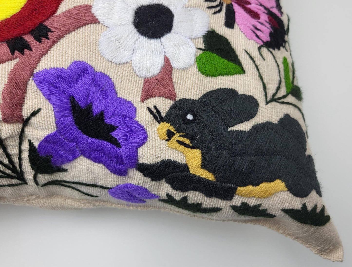 Hand-embroidered and woven Mexican cushion cover with animal pattern β Unique handicrafts from Mexico