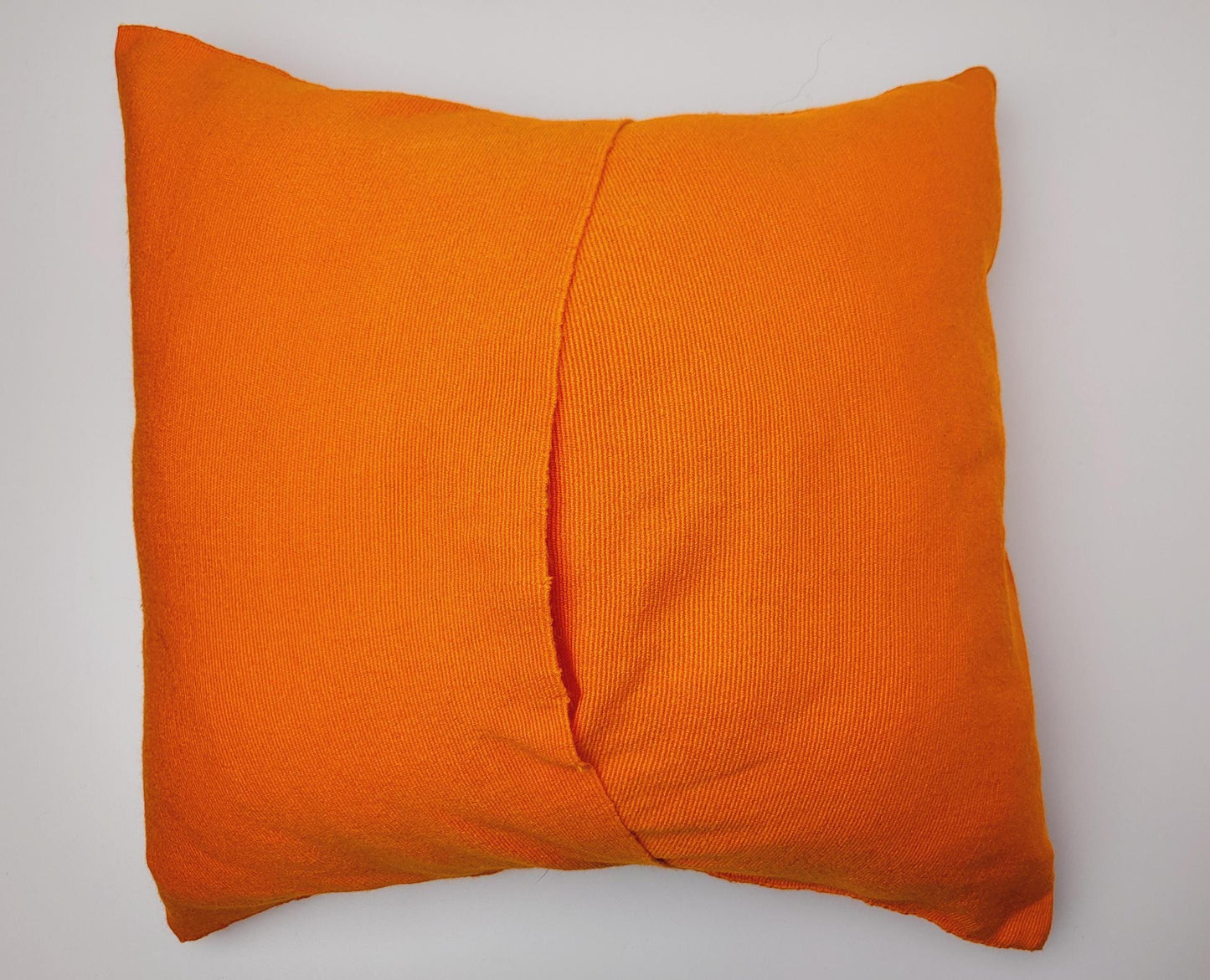 Hand embroidered and woven Mexican cushion cover with vibrant animal patterns