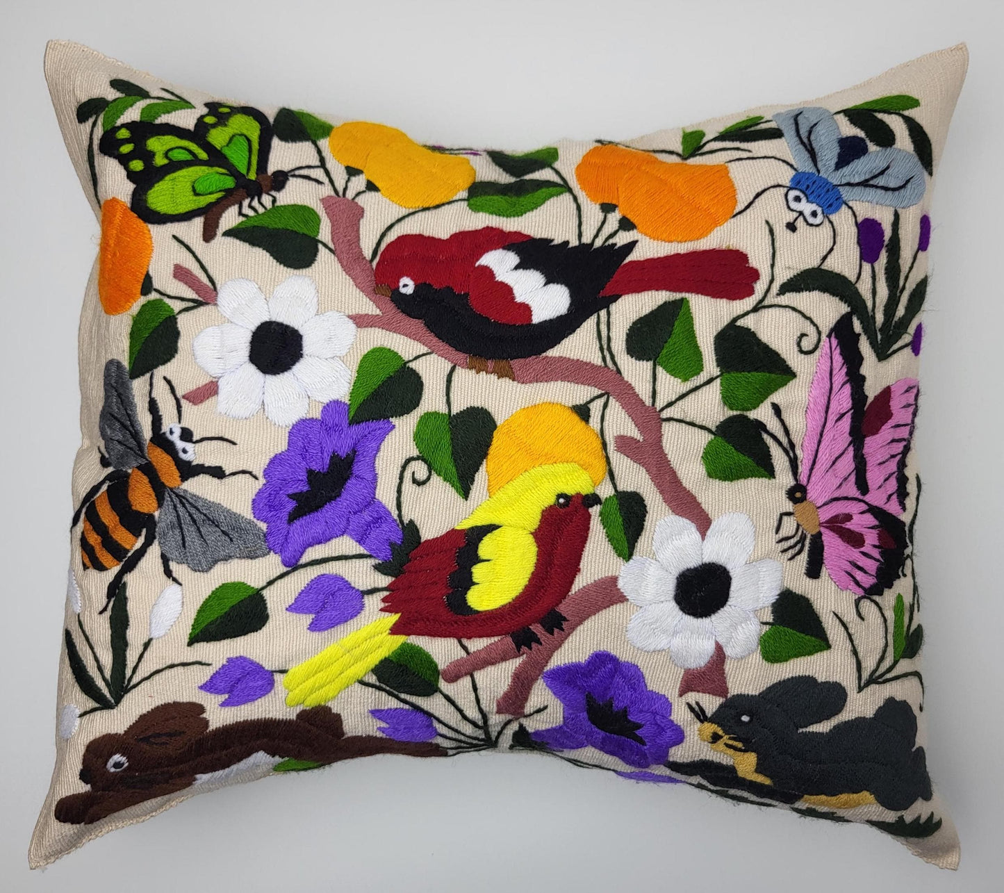 Hand-embroidered and woven Mexican cushion cover with animal pattern β Unique handicrafts from Mexico
