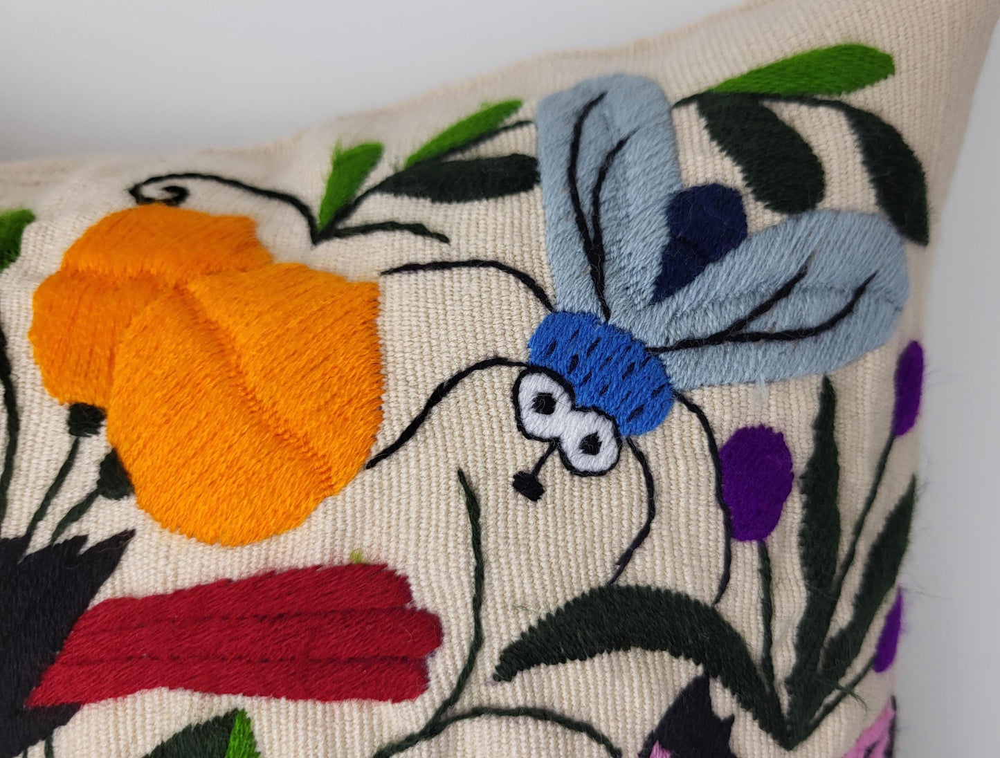 Hand-embroidered and woven Mexican cushion cover with animal pattern β Unique handicrafts from Mexico