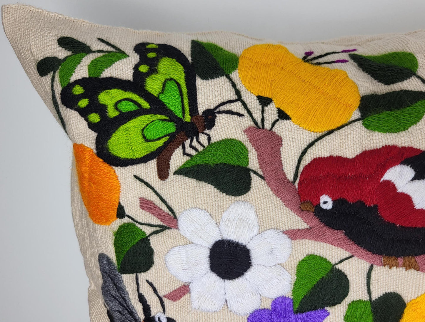 Hand-embroidered and woven Mexican cushion cover with animal pattern β Unique handicrafts from Mexico