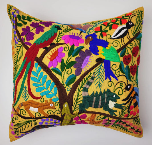 Hand embroidered and woven Mexican cushion cover with vibrant animal patterns