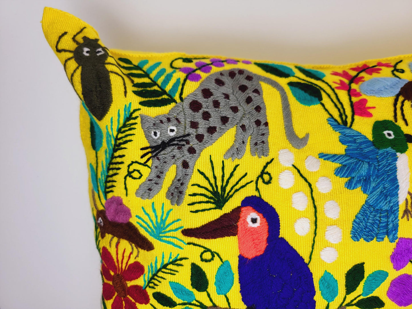 Handwoven and embroidered cushion cover with lovely animal motif