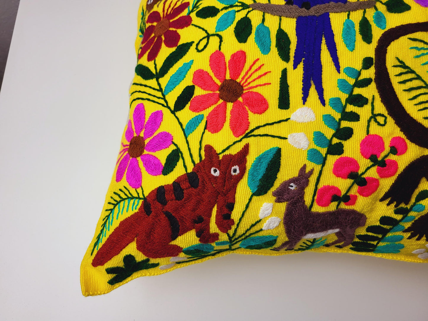 Handwoven and embroidered cushion cover with lovely animal motif