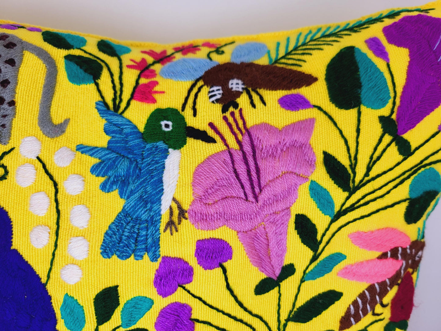 Handwoven and embroidered cushion cover with lovely animal motif