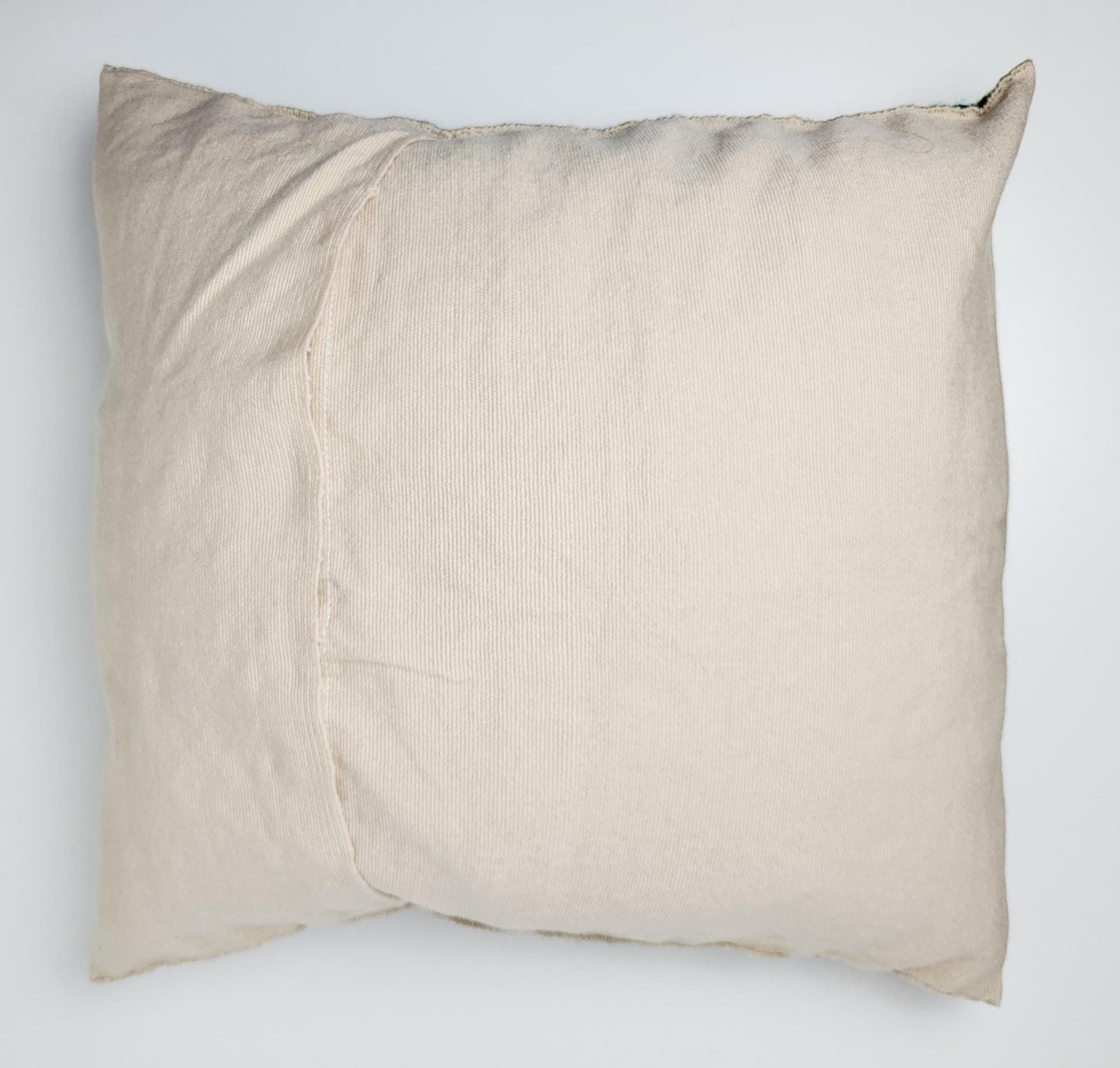 Von mexikanischen Indigenen besticktes und gewebter Kissenbezug